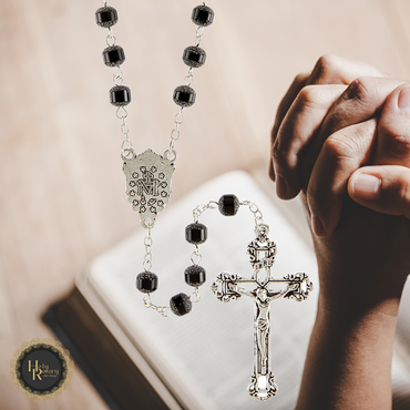 Classic black rosary beads with cross a popular religious jewelry item for prayer and reflection