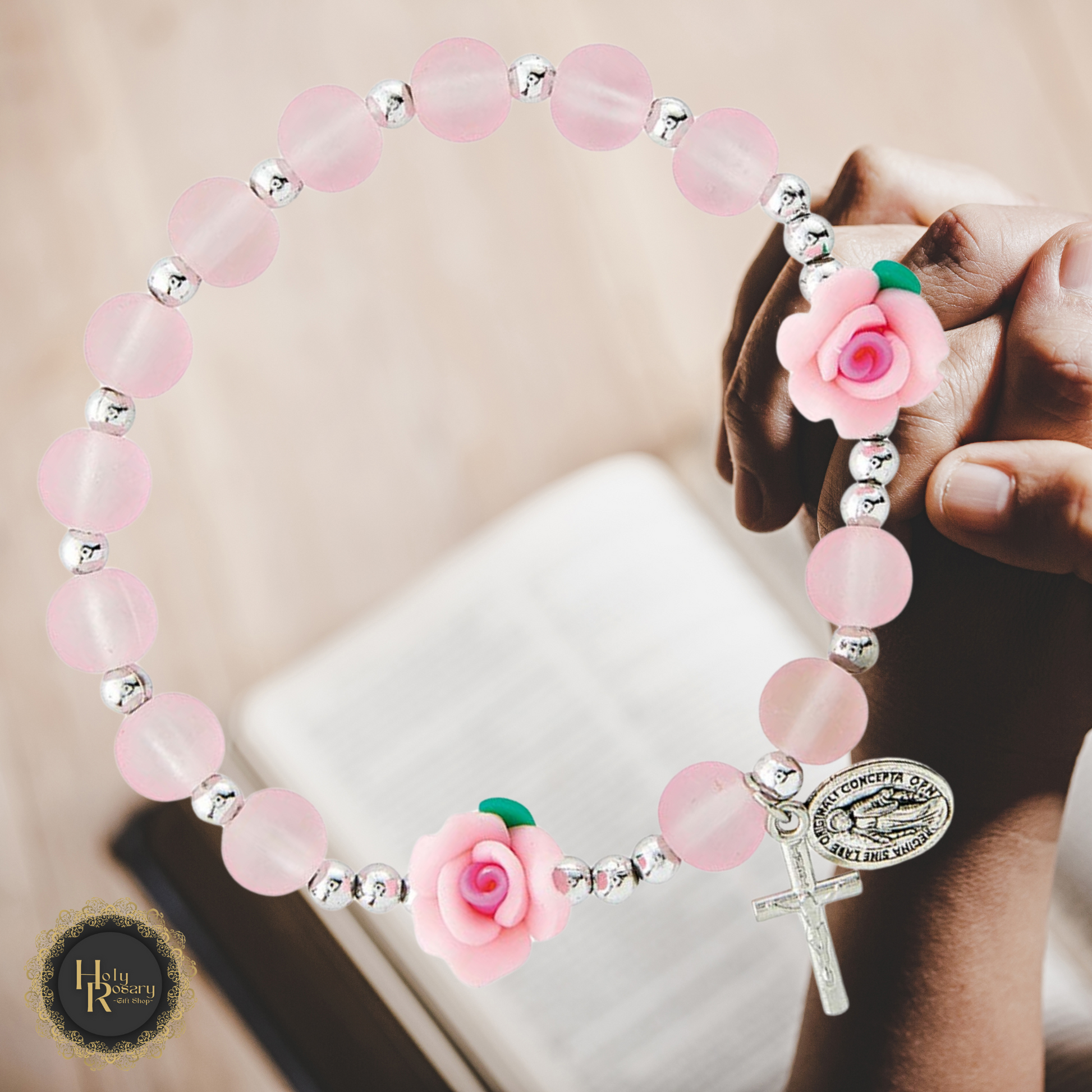 Close up of women's rosary bracelet highlighting durable links a popular choice for devotion