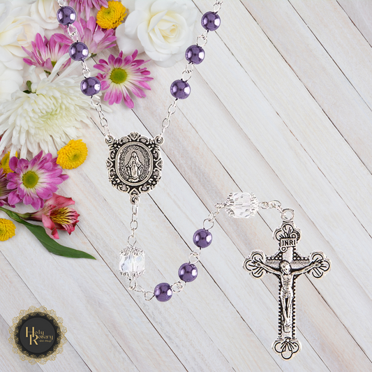 Purple pearl and crystal rosary beads with Miraculous Medal centerpiece