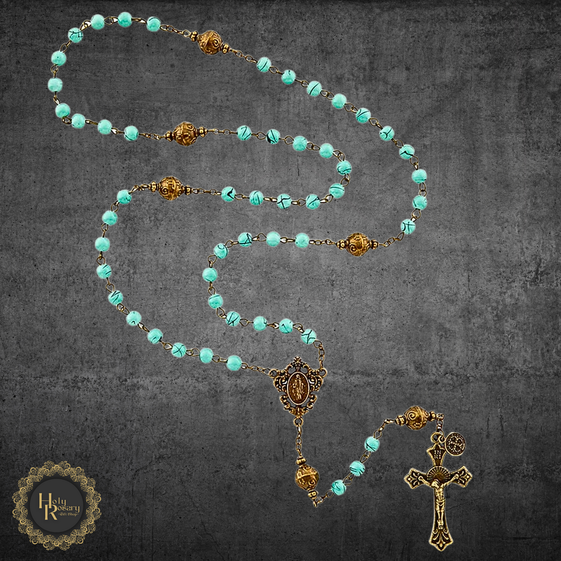 Rosary bead necklace laid flat showing each bead and cross detail suitable for men or women and available online