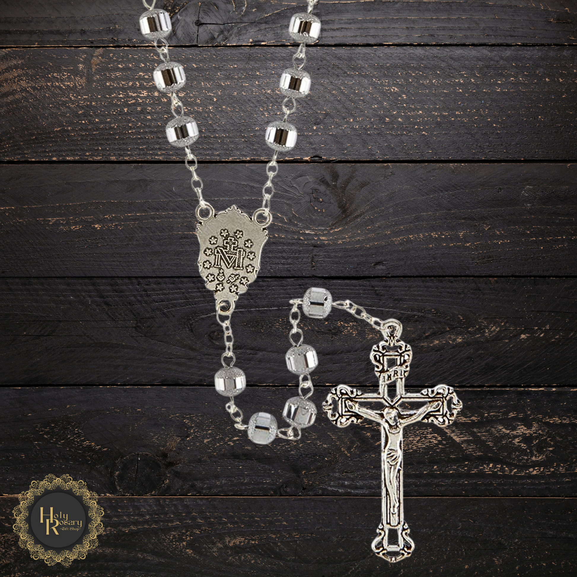 Beautiful display of silver rosary necklace a cherished religious accessory for both men and women