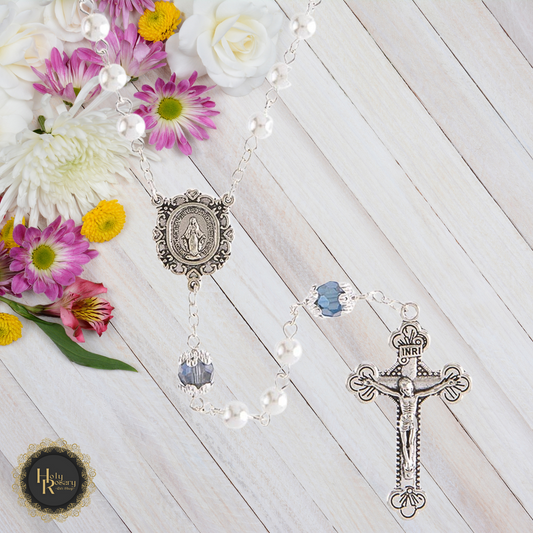 White Pearl Rosary Necklace with intricate beads and a silver cross