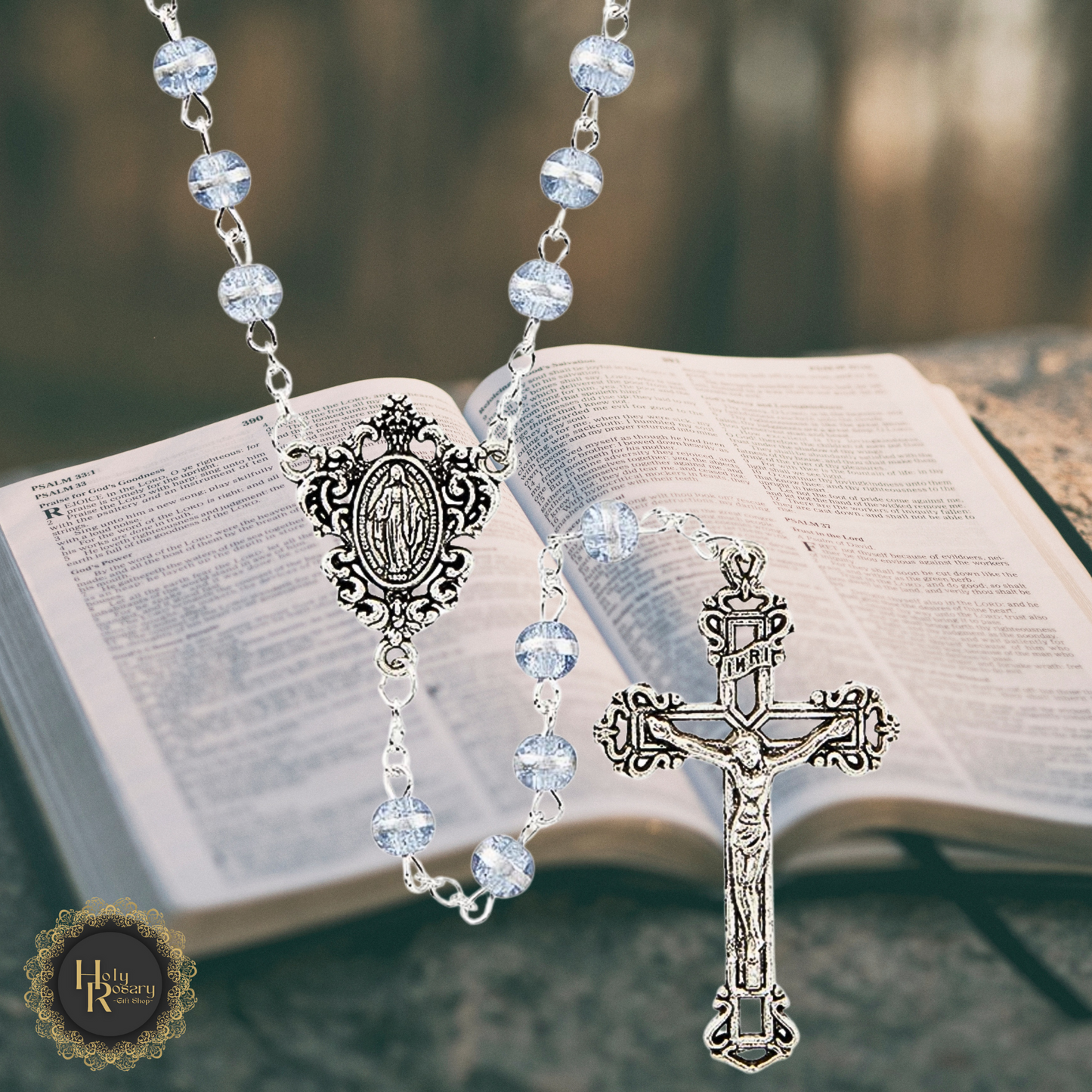 Violet rosary beads displayed during prayer and devotion